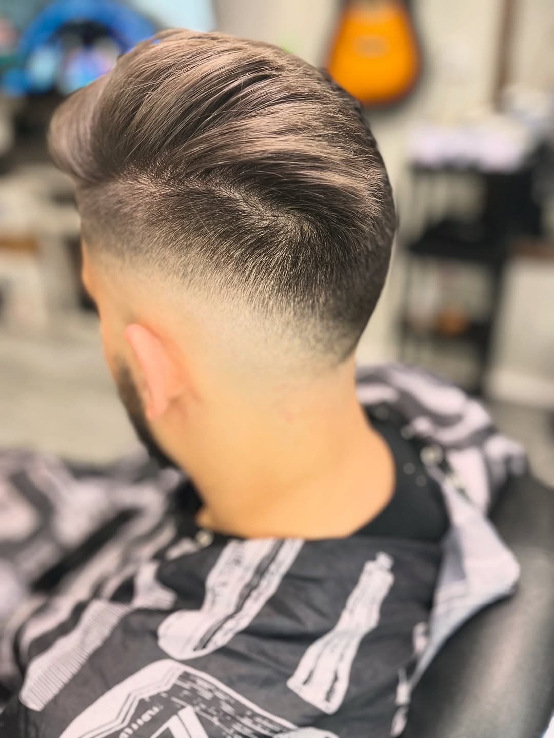 Mid skin fade with smooth back blend