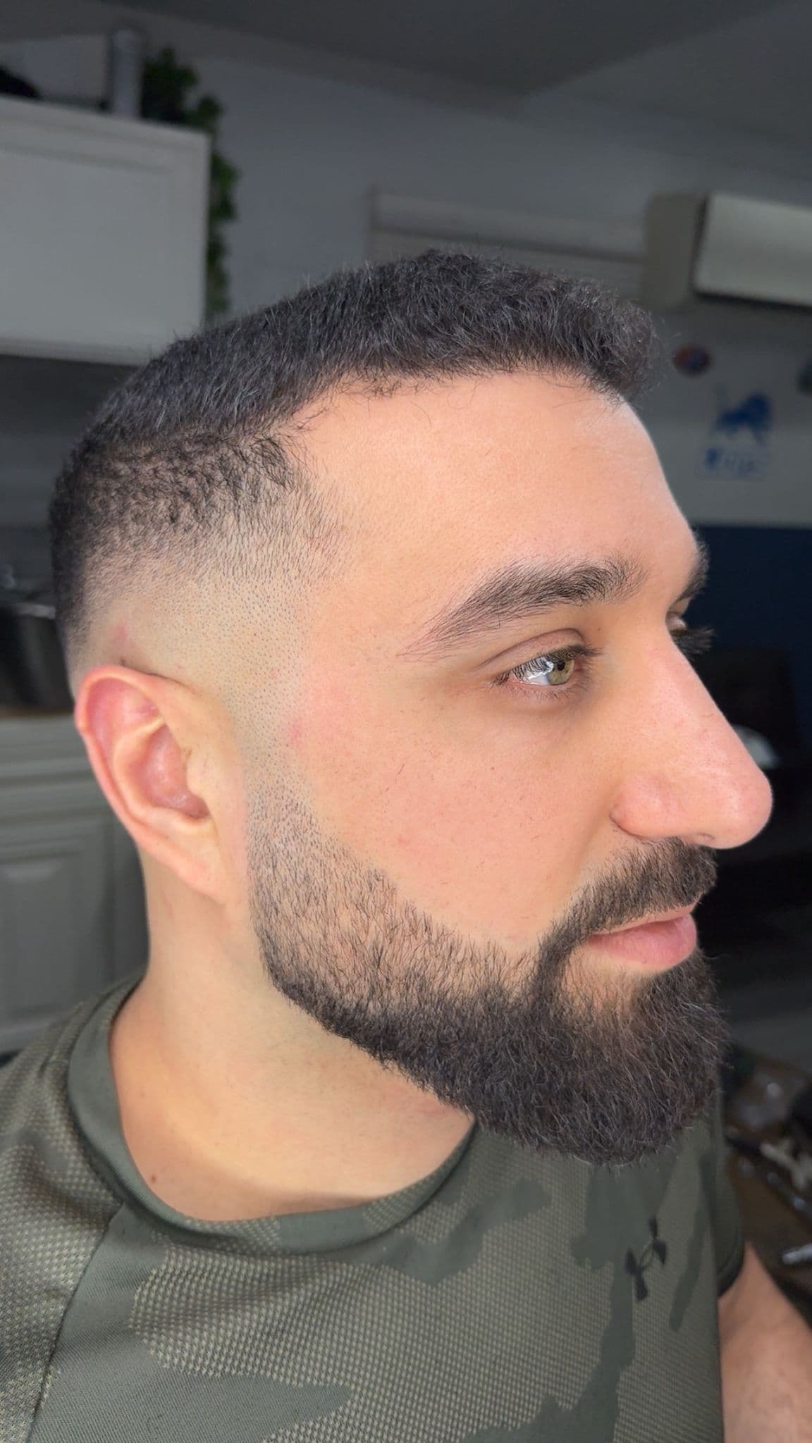 Mid skin fade with sharp beard line-up and clean blend